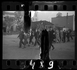 Jewish police marching in the ghetto