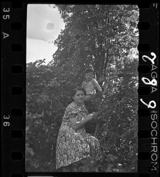 Mother with a young boy on a ladder