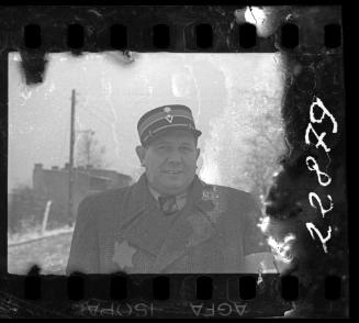 Portrait of a Jewish policeman in the ghetto