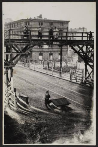 The pedestrian bridge crossing Zigerska Street, the “Aryan” street, that divided the ghetto into two areas, Lodz Ghetto                                                   
