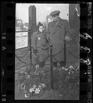 Residents in the ghetto cemetery