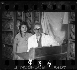 Manager with his daughter in the bakery