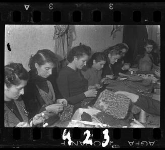 Women working in a textile and garment workshop in the ghetto