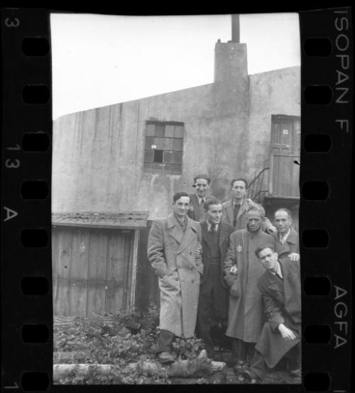Members of the ghetto administration standing outside a building in the ghetto
