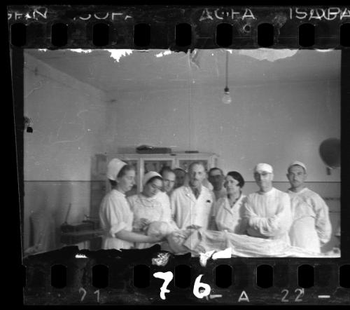 Doctors and nurses with patient