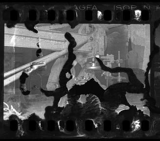 Man working in a garments and textiles workshop in the ghetto