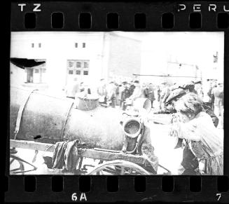 Fecal workers hauling a sewage collecting tank mounted on a wagon through the ghetto