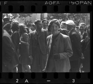 Crowd of residents gathered in the street
