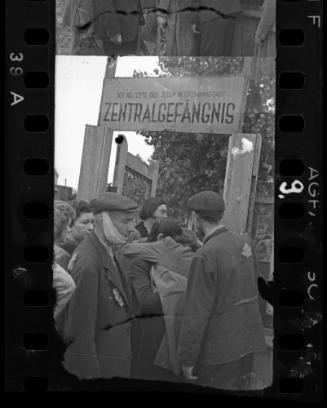 Line-up of residents at gate of the 'Zentralgefagnis' [German: 'central prison'] on Czarnecki Street prior to deportation