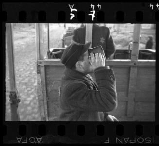 Man drinking from cup
