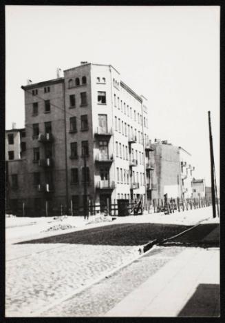 Six-storey building on street corner in the Gypsy Camp