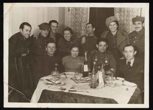 After liberation, group portrait of ghetto officials and wives