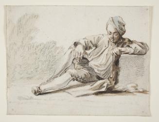 Reclining Man Smoking a Pipe