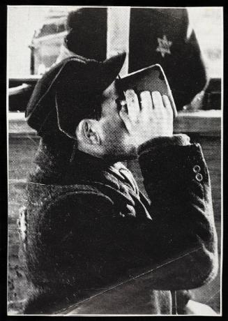Man drinking from pail