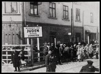 “Juden” - a sign  for the  Jewish residential area (Baluty) restriction, Lodz Ghetto