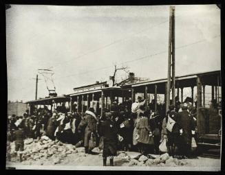 Boarding tram for deportation