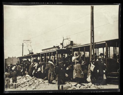 Boarding tram for deportation