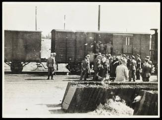 Boarding deportation train at Radogoszcz Station