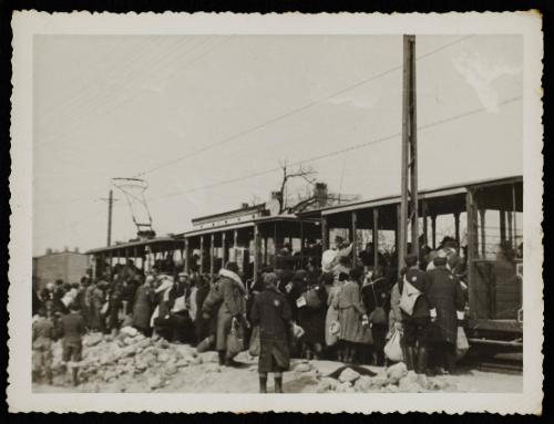 Boarding tram for deportation