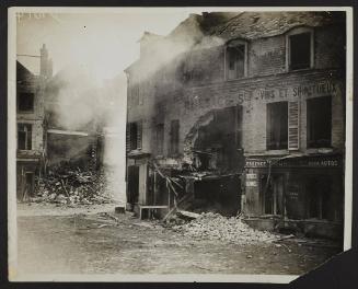 The Fall of Peronne. Building in flames in Peronne
