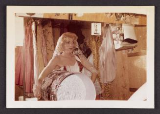 [Susanna looking in the mirror, location unknown]
