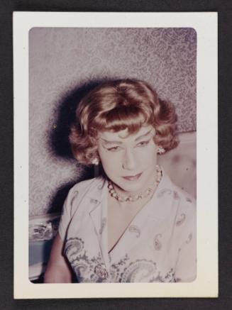 [Gail in a paisley dress, location unknown]
