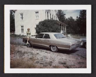 [Susanna sitting on the roof of a car, Casa Susanna, Hunter, NY]
