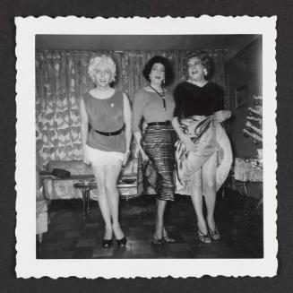 [Susanna and two friends showing some leg in Susanna and Marie’s New York City apartment]
