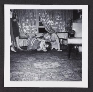 [Susanna and a friend rolling off the couch in Susanna and Marie’s New York City apartment]
