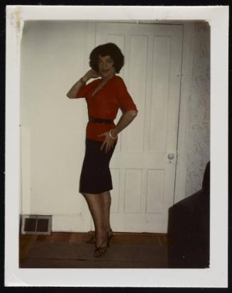 [Susanna in a red shirt and black belt, location unknown]
