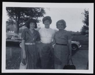 [Susanna and two friends outside, location unknown]
