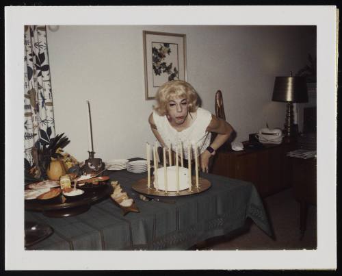 [Susanna and friends blowing out candles, location unknown]
