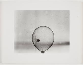 Bullet thru Helium Soap Bubble