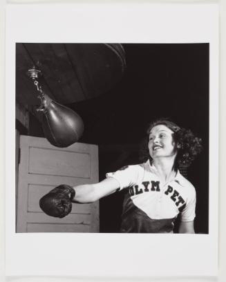 Irish Woman Hitting Punching Bag