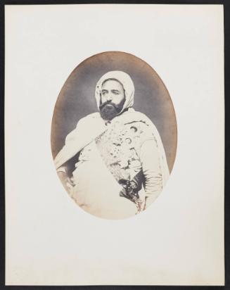 260. Emir Abd-el-Kader (57 years old) Born in Mascara (Oran province) (Algeria) Black hair, though he shaves his head daily; brown eyes, black beard with a few gray hairs. Son of Mouhi-Eddin and Zora; grandson of Moustapha ben Makta and Doha. Photographed in Paris.