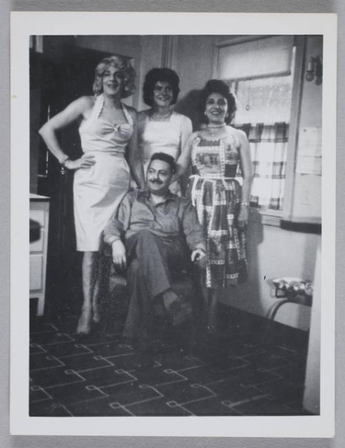 [Susanna, Edith, and Marie with a man holding a cable release, Chevalier d’Éon, Hunter, NY]
