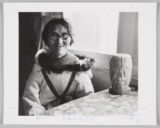 Neeveuvuk with a carving