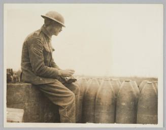 [British Corporal Checking Shells on a Light Railway, Wytschaete, 11 August 1917]