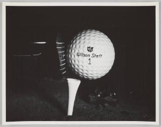 golf club strikes ball