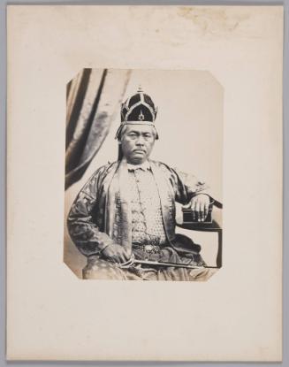 63. Hluang Indrinontay (46 years old) Chief Officer for municipal tax collection for the city of Bangkok, serving H.M. the first King of Siam; responsible for the Royal gifts sent to H.M. the Emperor of France. In full dress. born in Bangkok (Siam, now Thailand) to a Chinese father and a Siamese mother.